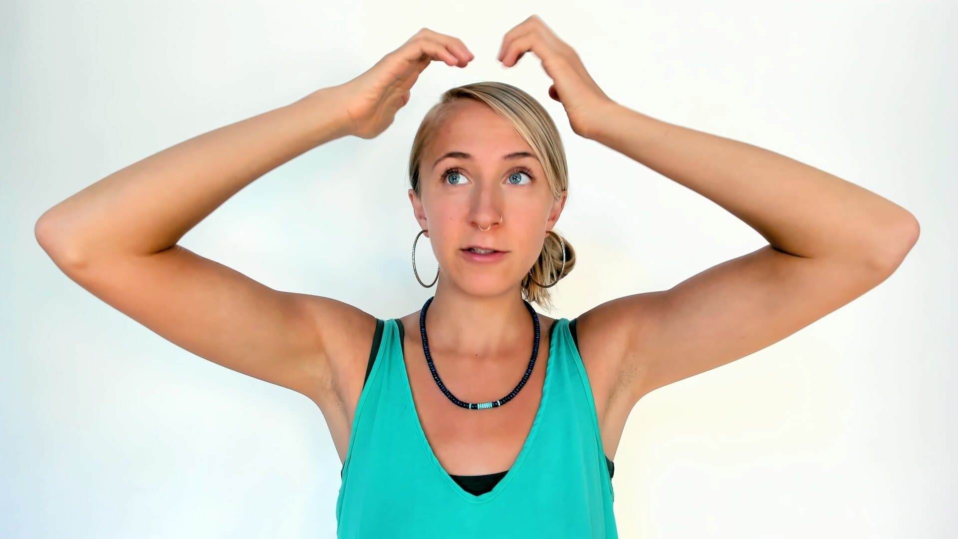 EFT tapping demonstration with thumbs near the hand